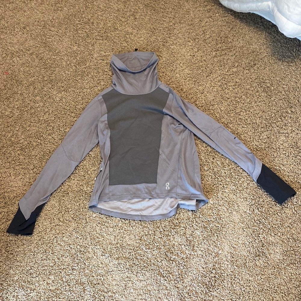 On running grey long sleeve weather shirt